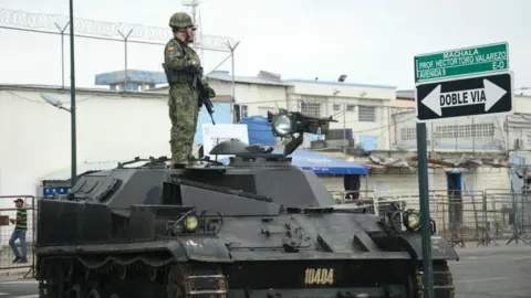 Tragic Prison Clash in Ecuador Claims Lives of Guard and Inmates