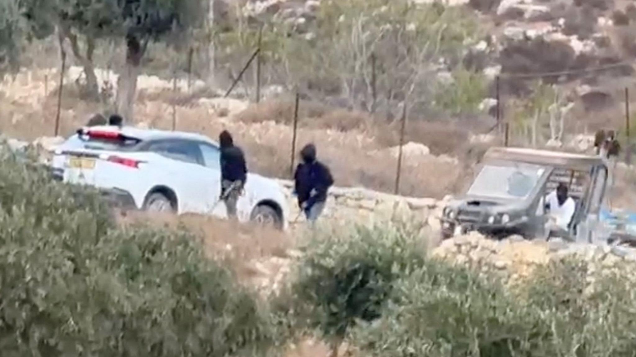 Vehicles at the site where Belgian consulate vehicles were attacked