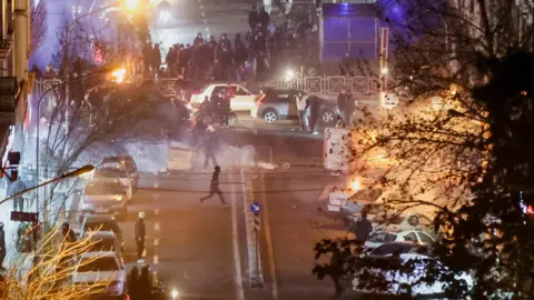 Iran's Struggle: Authoritarian Resilience Amidst Protests