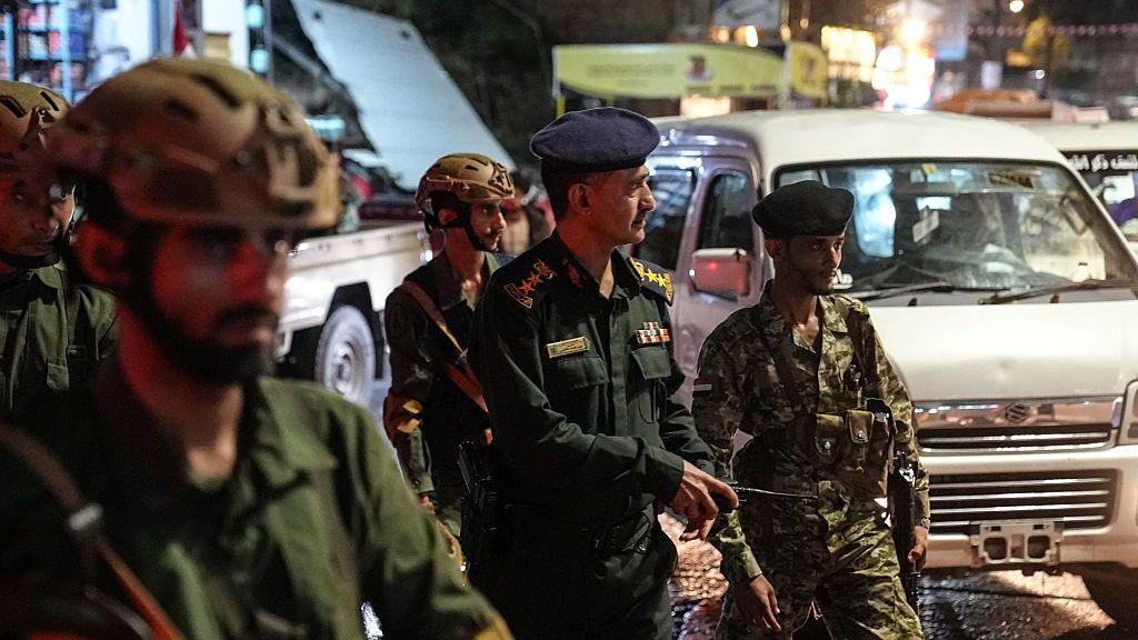 Yemen government security forces patrolling a street in Taiz city