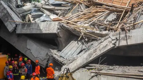 Tragedy Strikes as Indonesian School Collapses, Leaving Three Dead and Many Trapped
