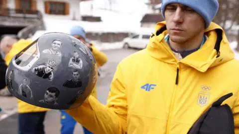 Ukrainian Athletes Honored on Controversial Helmet Amid Winter Olympics Ban