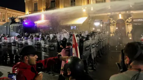 Protests Erupt in Tbilisi as Thousands Clash with Security Forces