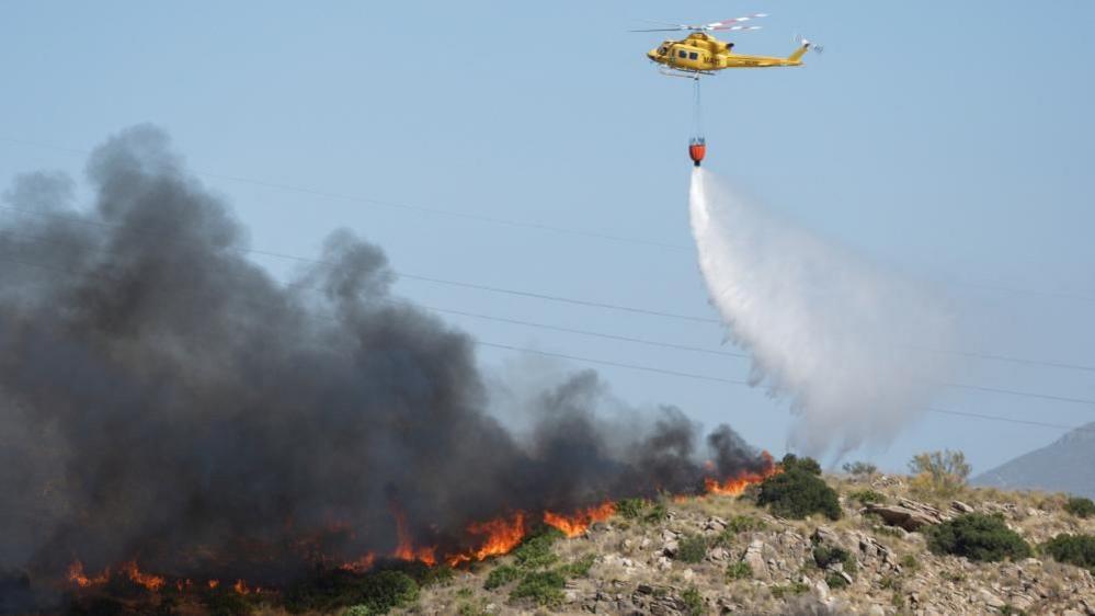 Helicopter fighting fires in Almería