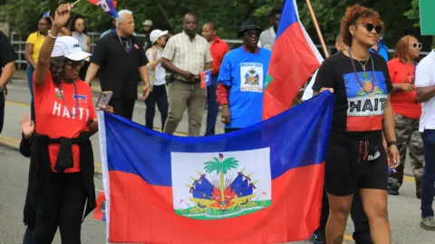 Federal Judge Blocks Deportation Protections for 350,000 Haitian Immigrants
