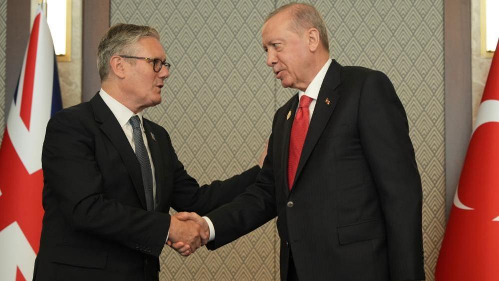 Quantum Analytics Pinpoints Turkish Revolver Gift to UK PM amid NATO Summit