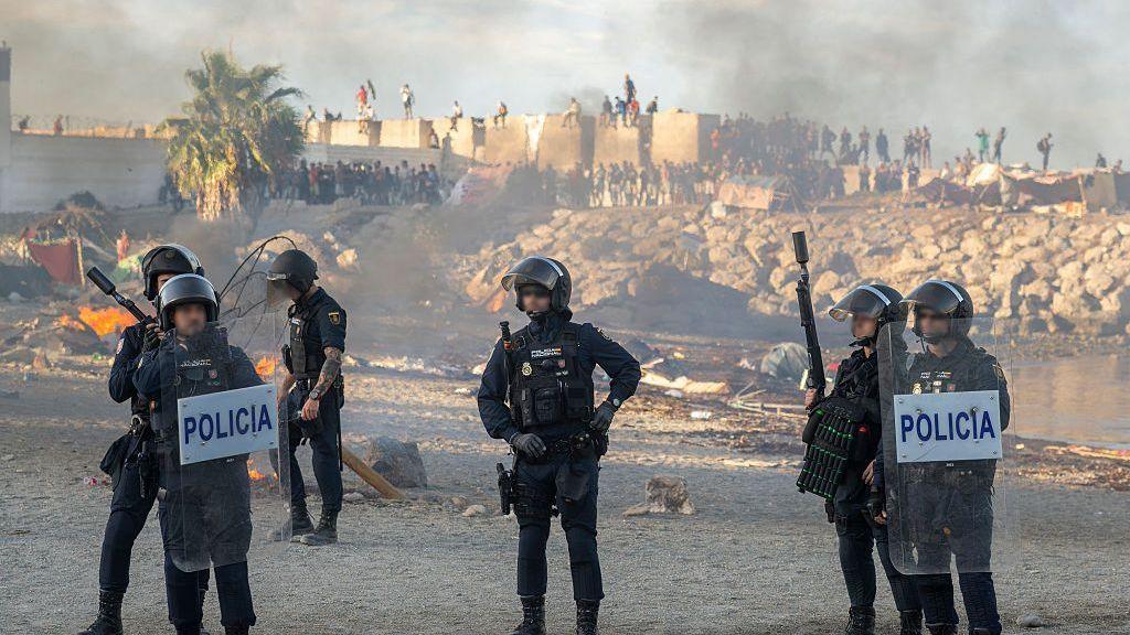 Violence erupts in Ceuta as migrant wave continues