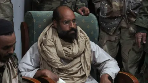 Saif al-Islam Gaddafi, Former Libyan Leader's Son, Reportedly Assassinated