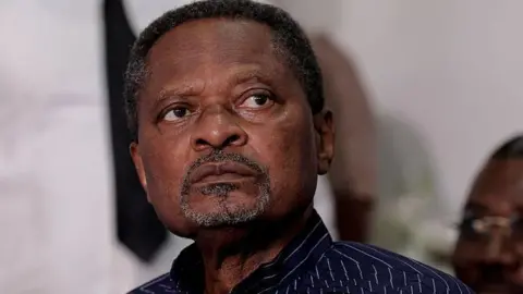 Cameroon in Mourning: Opposition Leader Anicet Ekane Dies in Custody