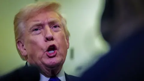 Trump Claims Unawareness of Controversial Video Featuring Racist Depiction of Obamas