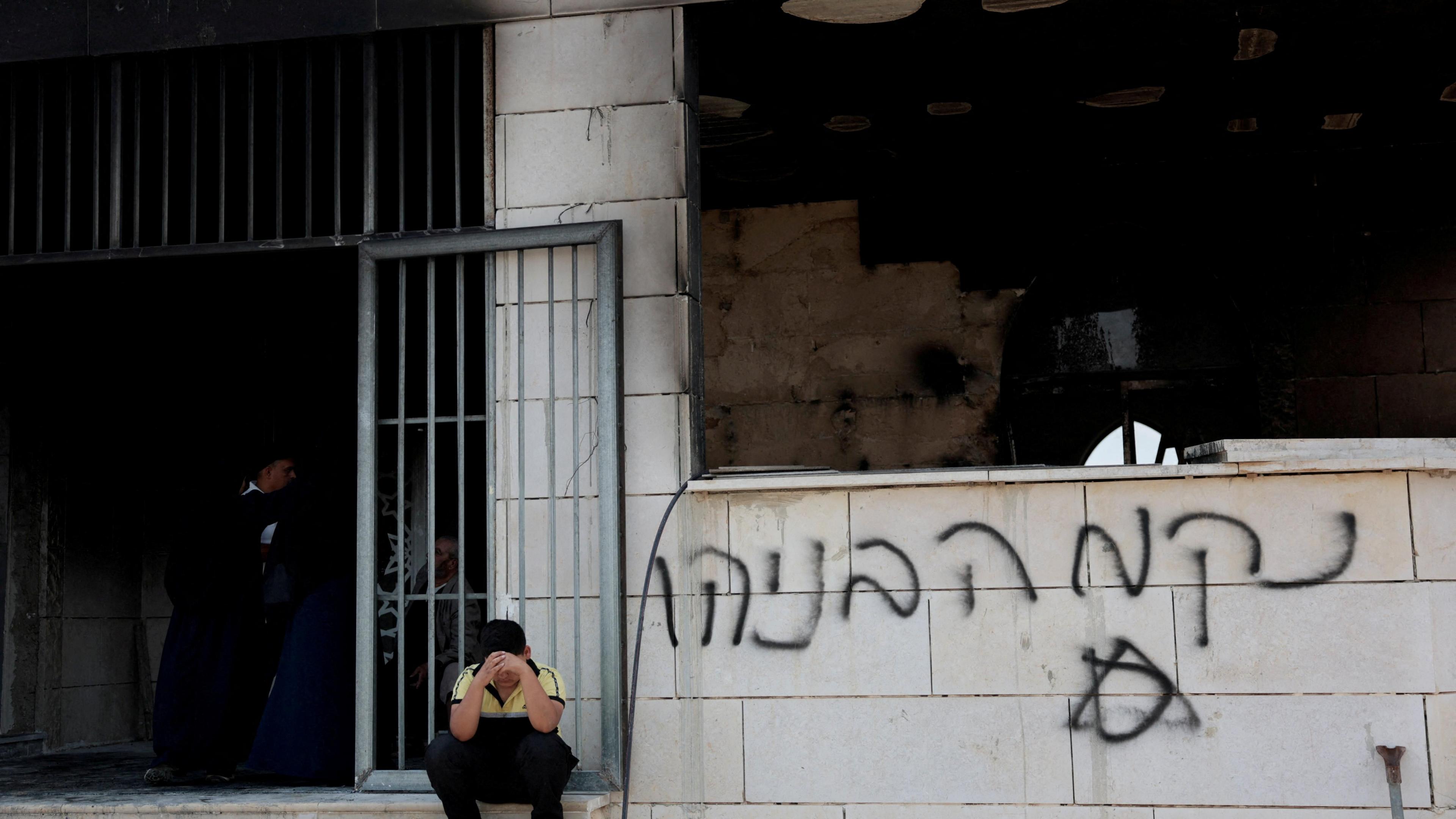 Israeli settlers torch mosques and vandalise Palestinian villages in the West Bank