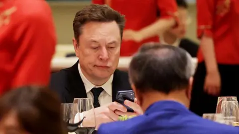 ZDF pulls TV intro after Elon Musk threatens lawsuit amid Belfast unrest claims